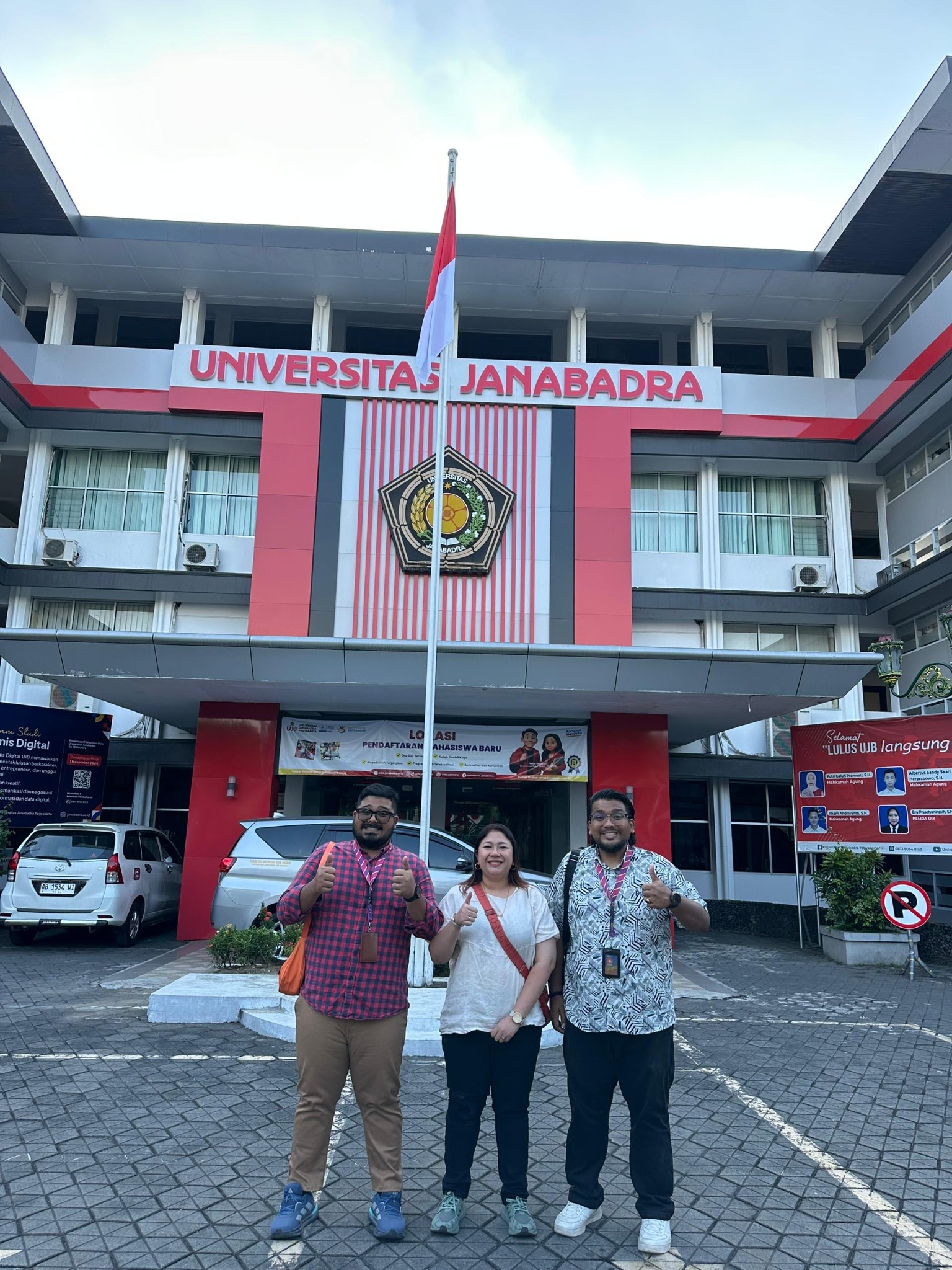 Fitri and colleagues outside Universitas Janabadra